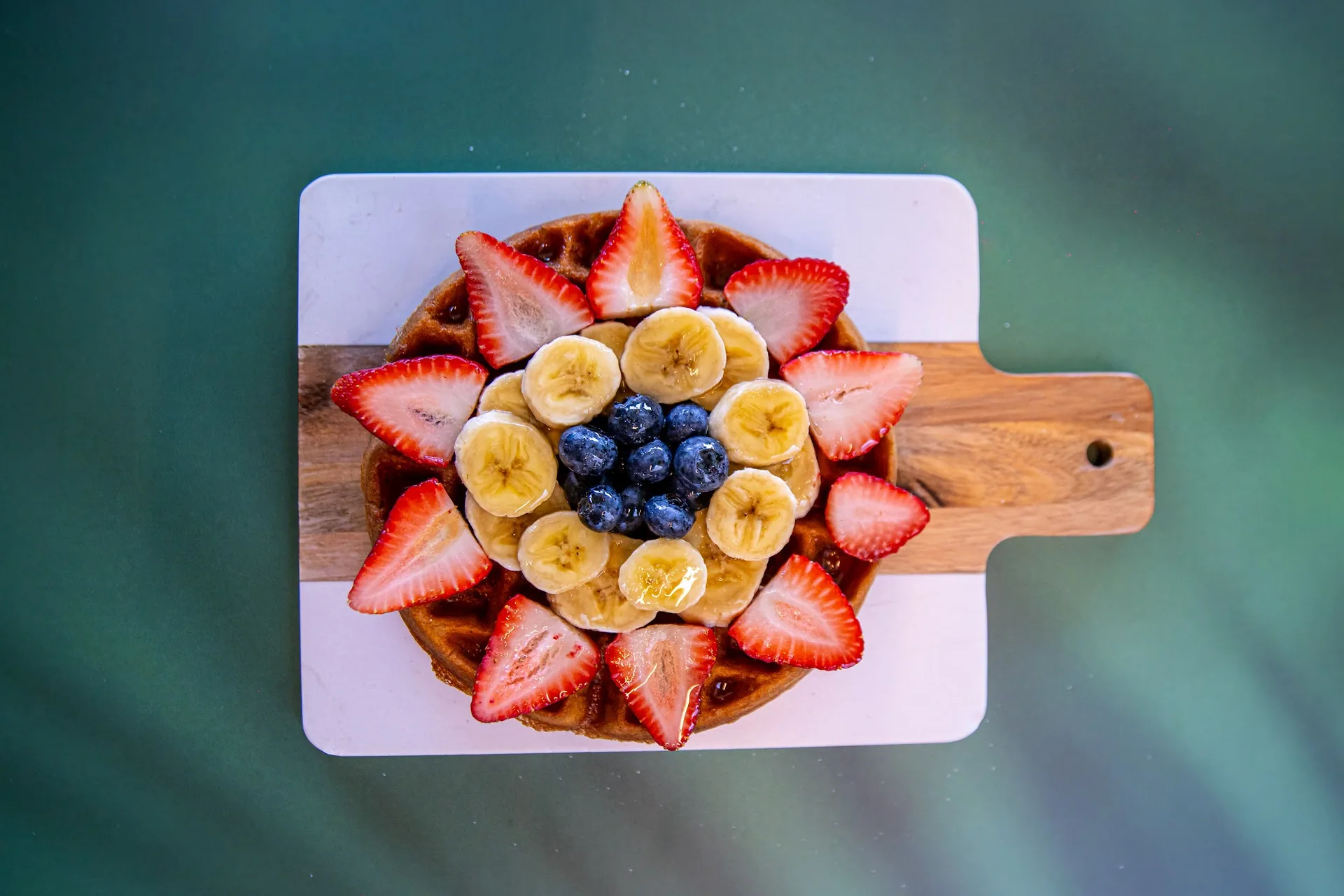 Protein waffle topped with fresh fruit
